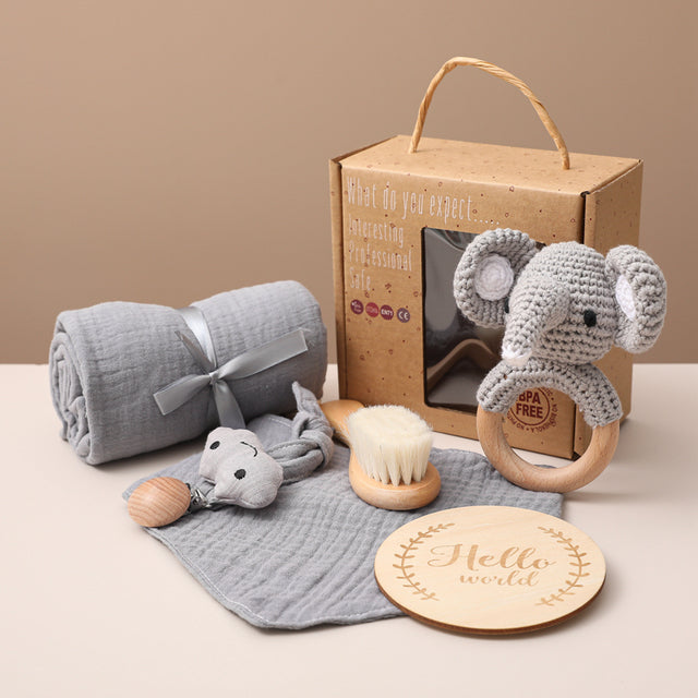 Ensemble de jouets de bain Bopoobo et assortiment d'accessoires d'emmaillotage pour nouveau-nés.